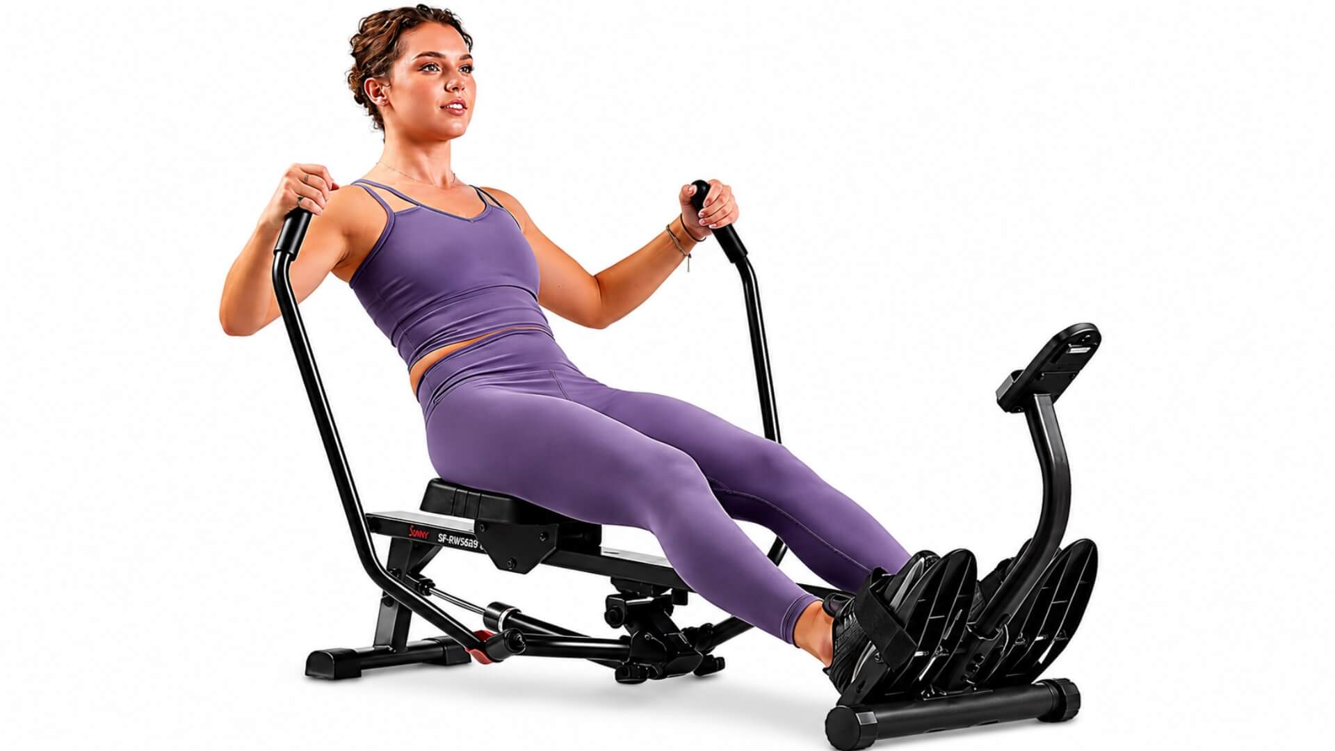 Irklavimo Treniruoklių Tipai (Rowing Machine Types) Irklavimo Treniruoklių Tipai (Rowing Machine Types). Moteris atlieka treniruotę hidrauliniu irklavimo treniruokliu su dviem nepriklausomomis rankenomis, stiprindama viršutinę ir apatinę kūno dalį.