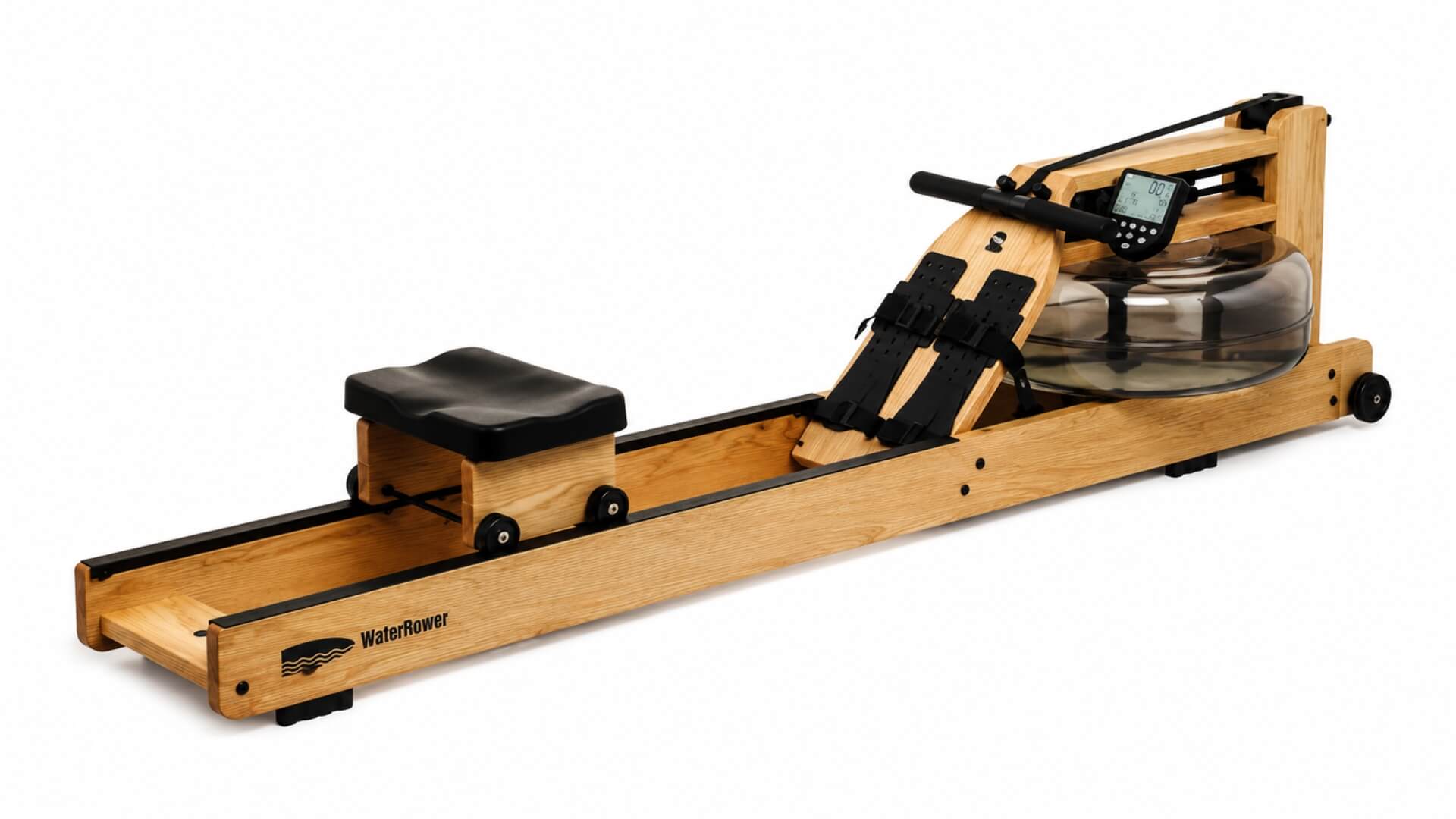 Irklavimo Treniruoklių Tipai (Rowing Machine Types) Irklavimo Treniruoklių Tipai (Rowing Machine Types). Medinis vandens irklavimo treniruoklis su vandens talpykla, judančia sėdyne, monitoriumi ir rankena, skirtas natūralų irklavimo pojūtį imituojančioms viso kūno treniruotėms.
